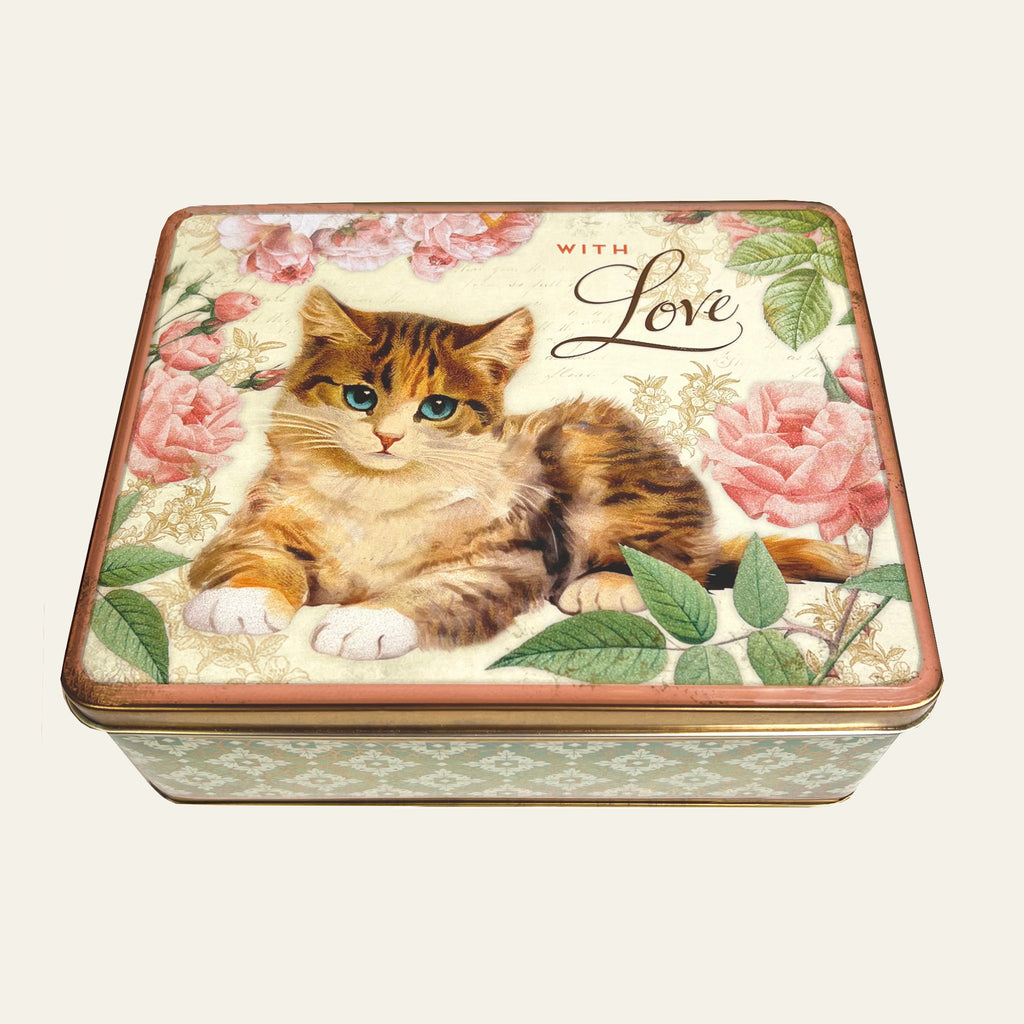 Vintage tin with a cat reproduced by Nostalgia design.