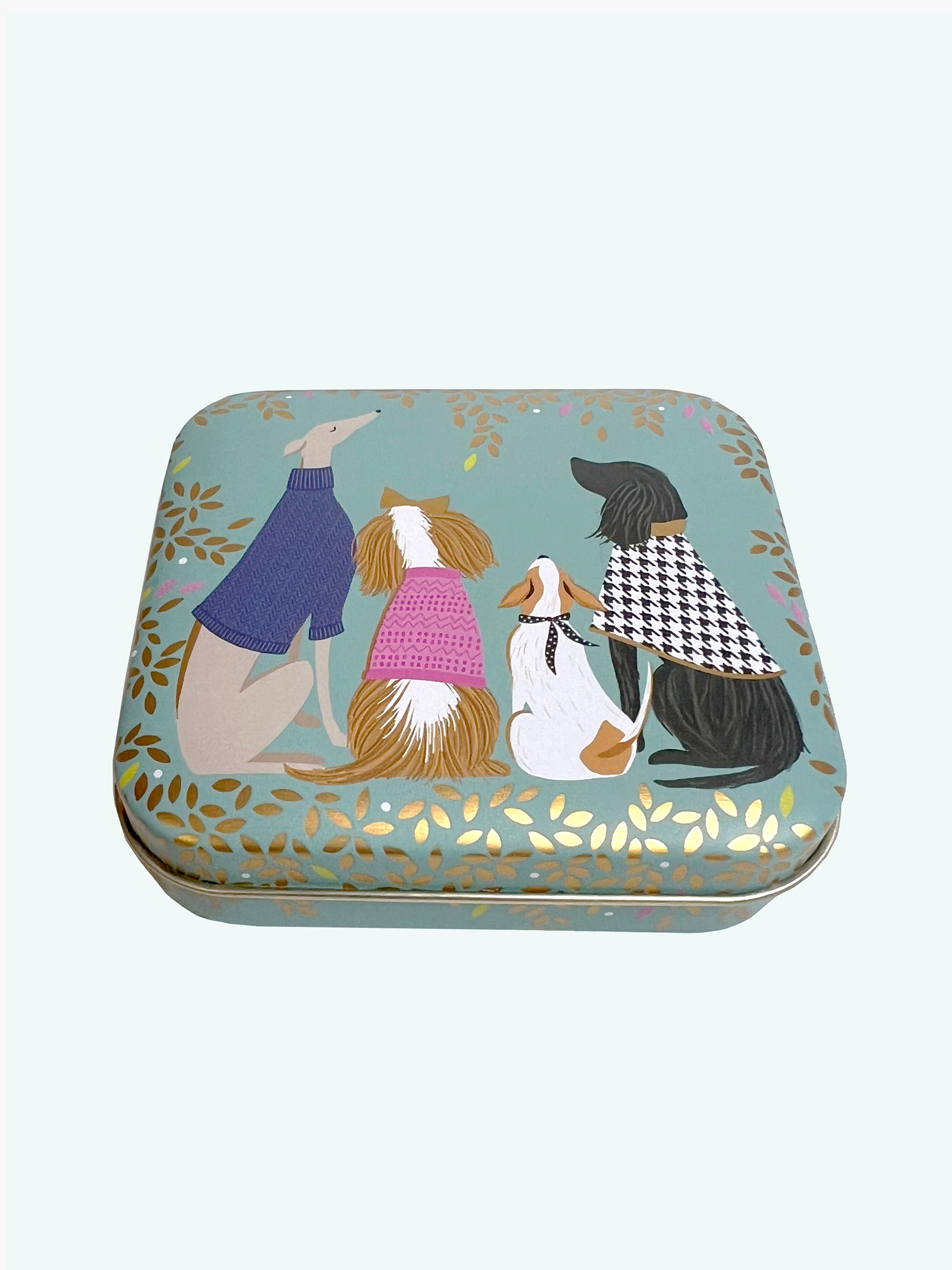 Dapper dogs design on hinged lid of small pocket tin by Sara Miller, London.