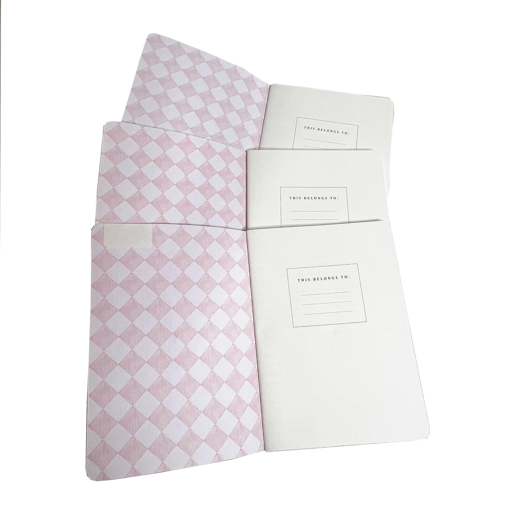 A trio of notebooks set in floral and checks by Cath Kidston.