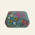 Small William Morris pocket tin with hinged lid.