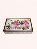 Pink roses in a heritage-style tin that opens with hinges, by Nostalgia.