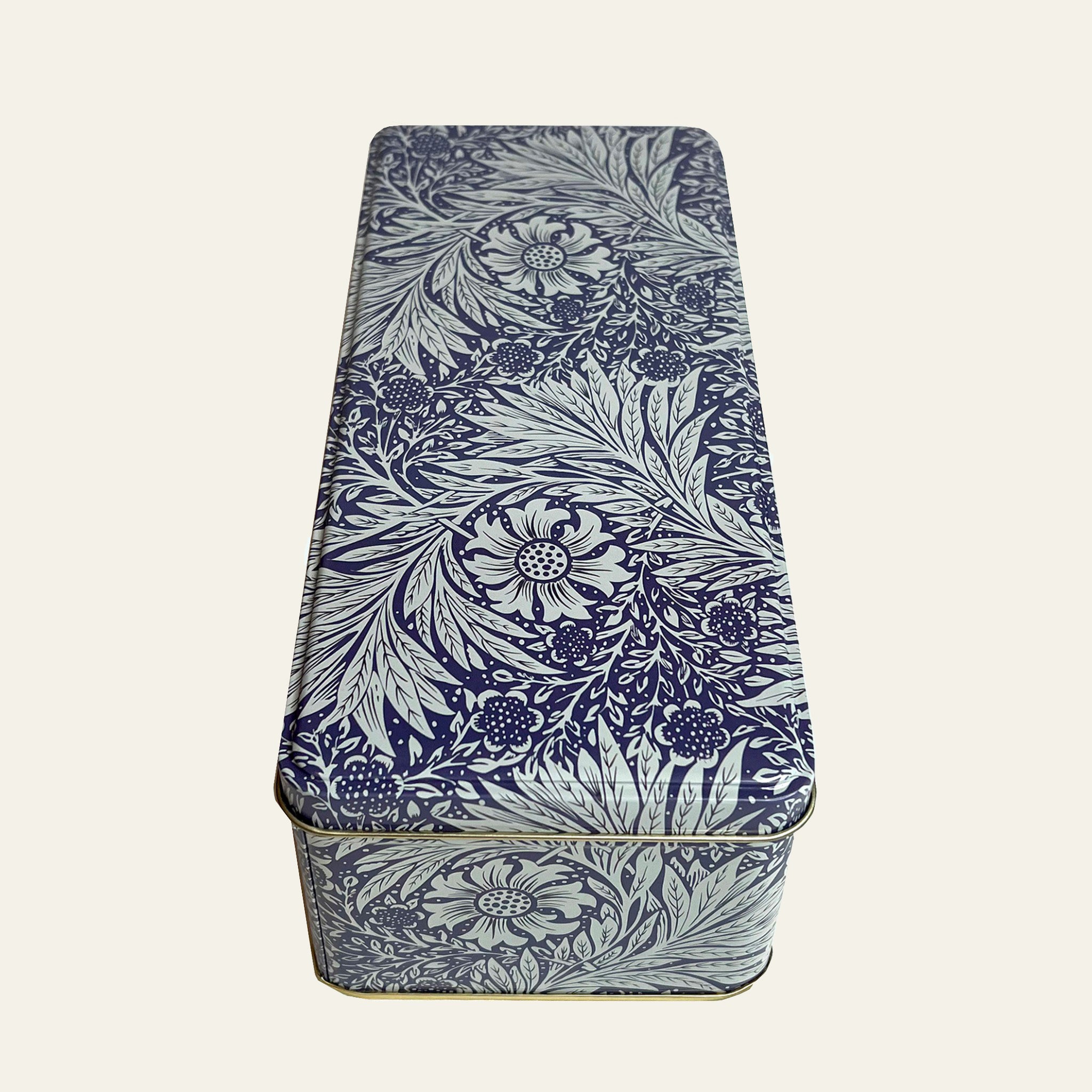 William Morris' great Marigold design and this deep rectangular tin makes perfect storage.