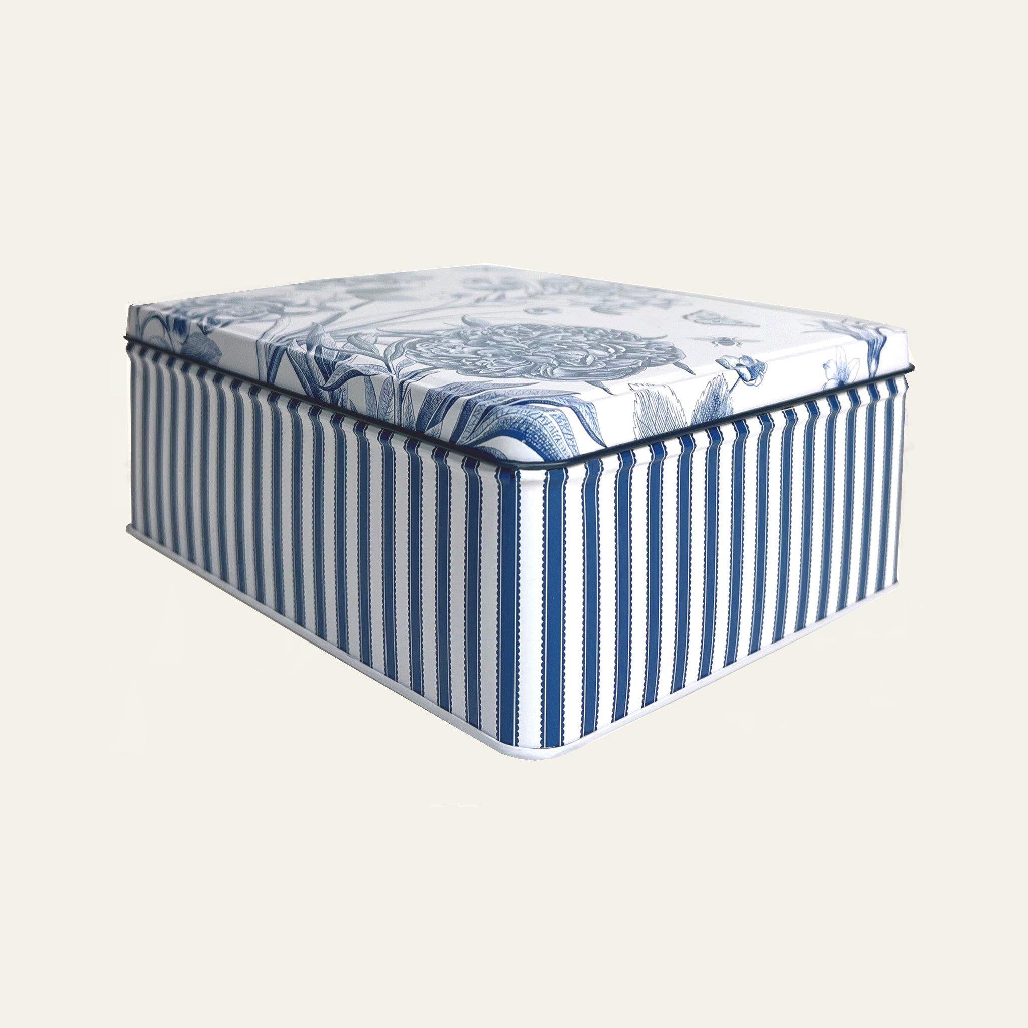Sanderson decor tin with blue stripes and flower etchings.