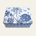 Sanderson decor tin with blue stripes and flower etchings.