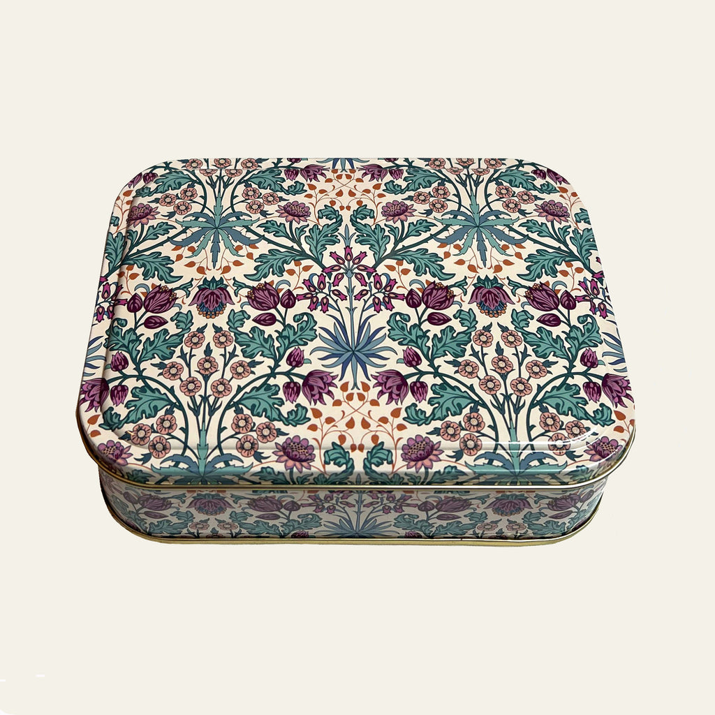 William Morris design on small metal tin with a lid.