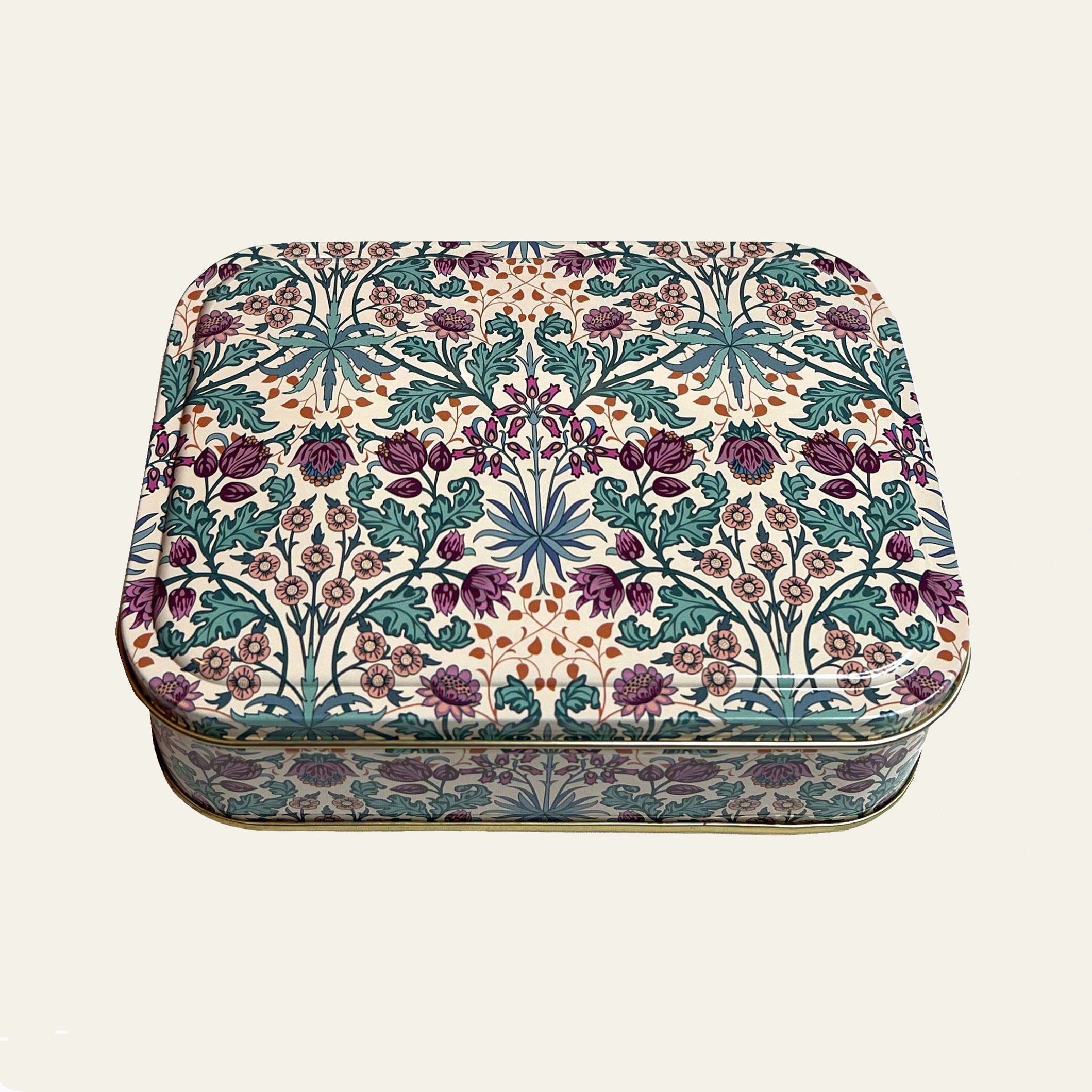 William Morris design on small metal tin with a lid.