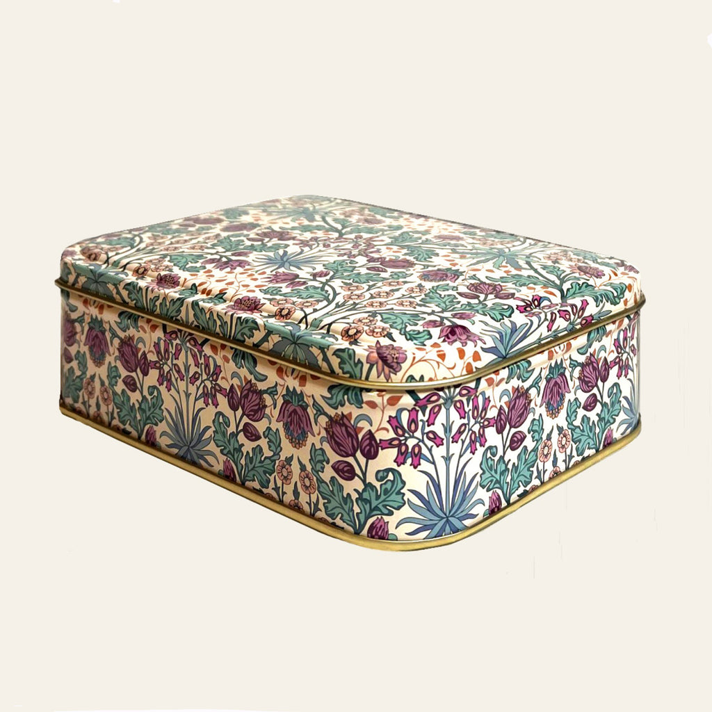 William Morris design on small metal tin with a lid.