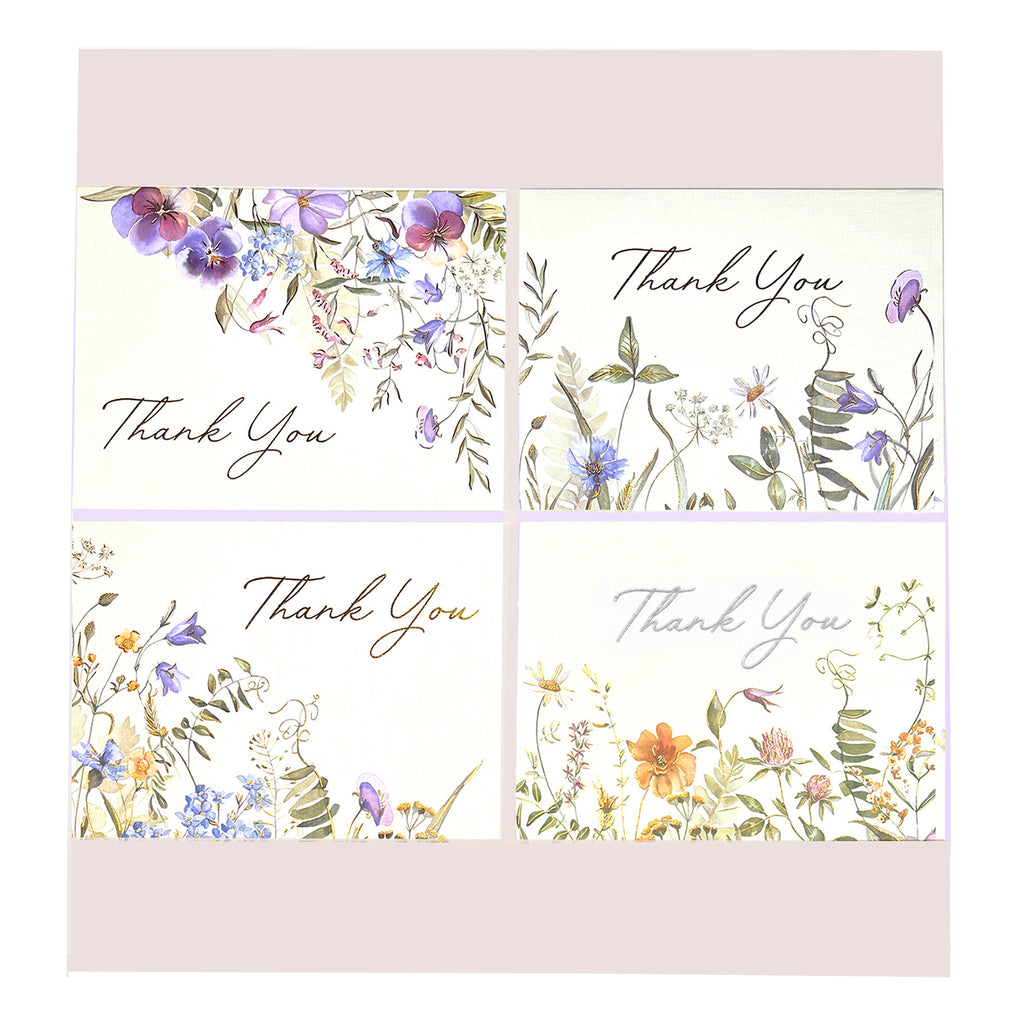 A treasure box of 20 thank-you cards with four designs and 21 lined envelopes by Peter Pauper Press, New York.
