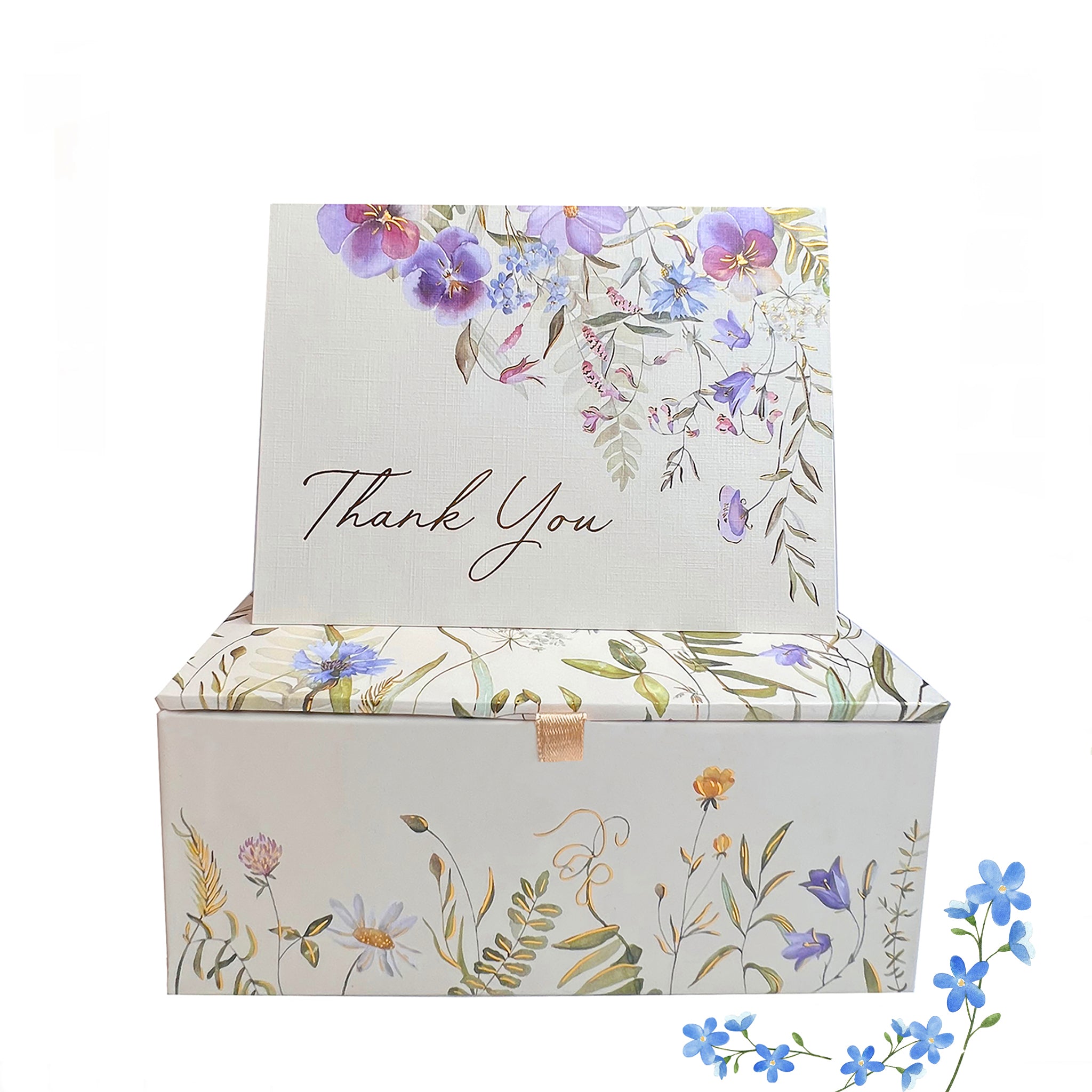 A treasure box of 20 thank-you cards with four designs and 21 lined envelopes by Peter Pauper Press, New York.