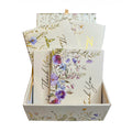 A treasure box of 20 thank-you cards with four designs and 21 lined envelopes by Peter Pauper Press, New York.