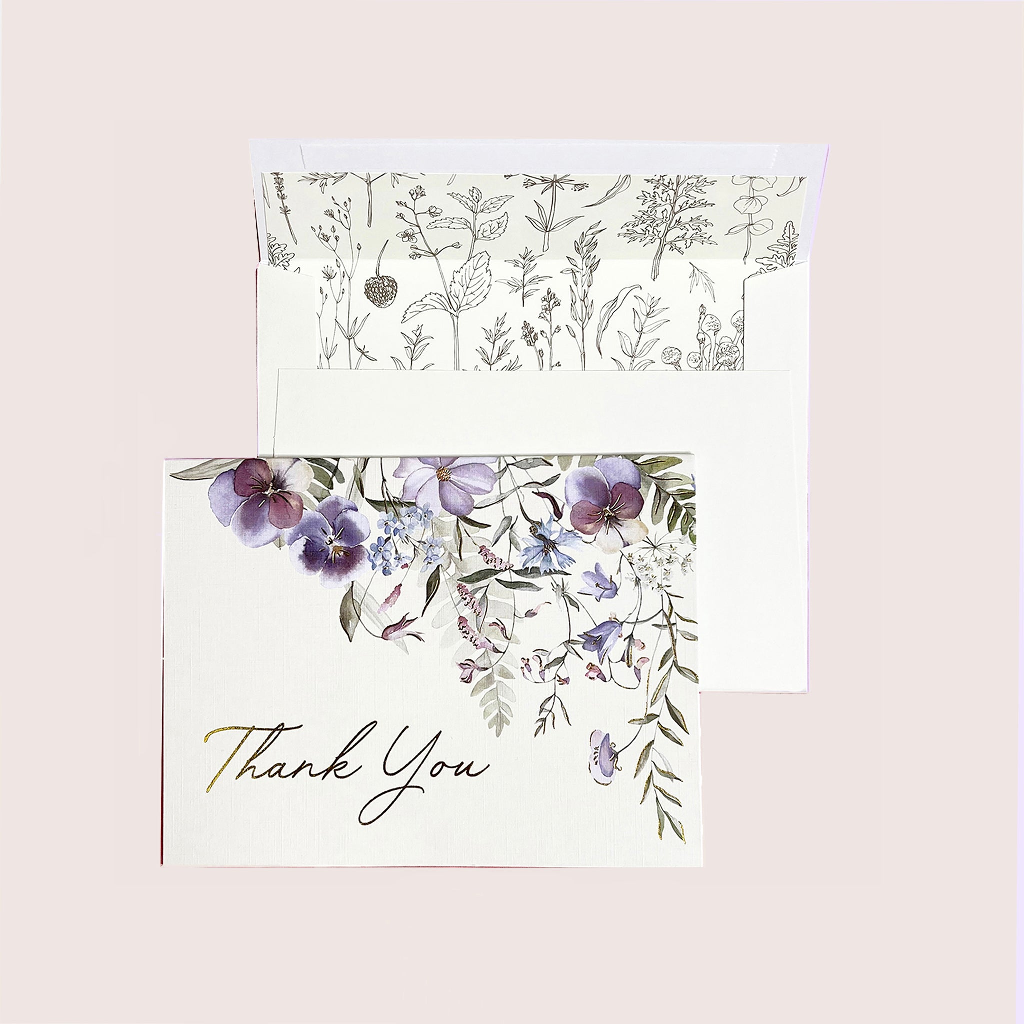 A treasure box of 20 thank-you cards with four designs and 21 lined envelopes by Peter Pauper Press, New York.