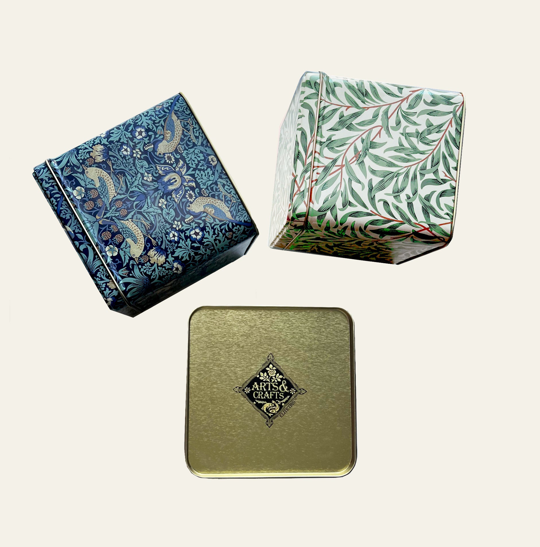 William Morris canister pack of three metal tins with hinged lids.