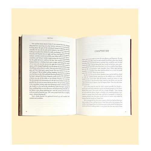 'The Adventures of Tom Sawyer' written by Mark Twain and published by Peter Pauper Press.